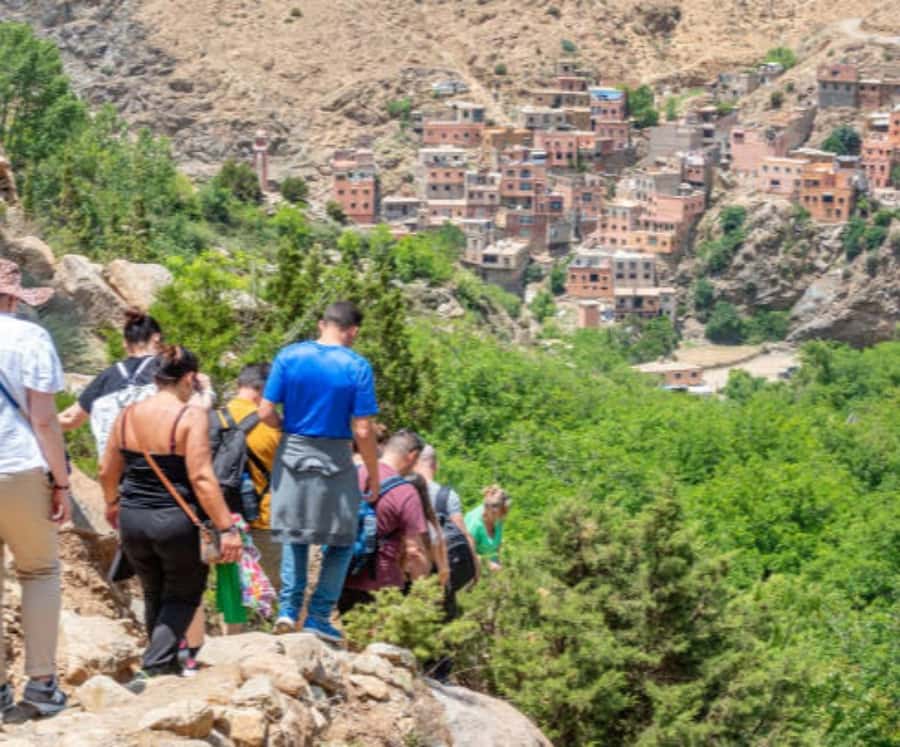 Marrakech: Ourika Valley,Waterfalls, Atlas Luxury Day trip - Tnin Ourika and the Valley Morning: Photos, Market Energy, and Clay Slopes