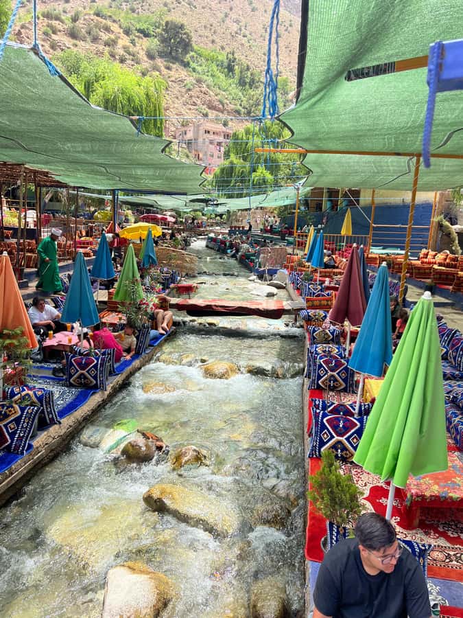 Marrakech: Ourika Valley Waterfalls Hike & Traditional Lunch - First valley stop: tea, breakfast, and cooperative culture