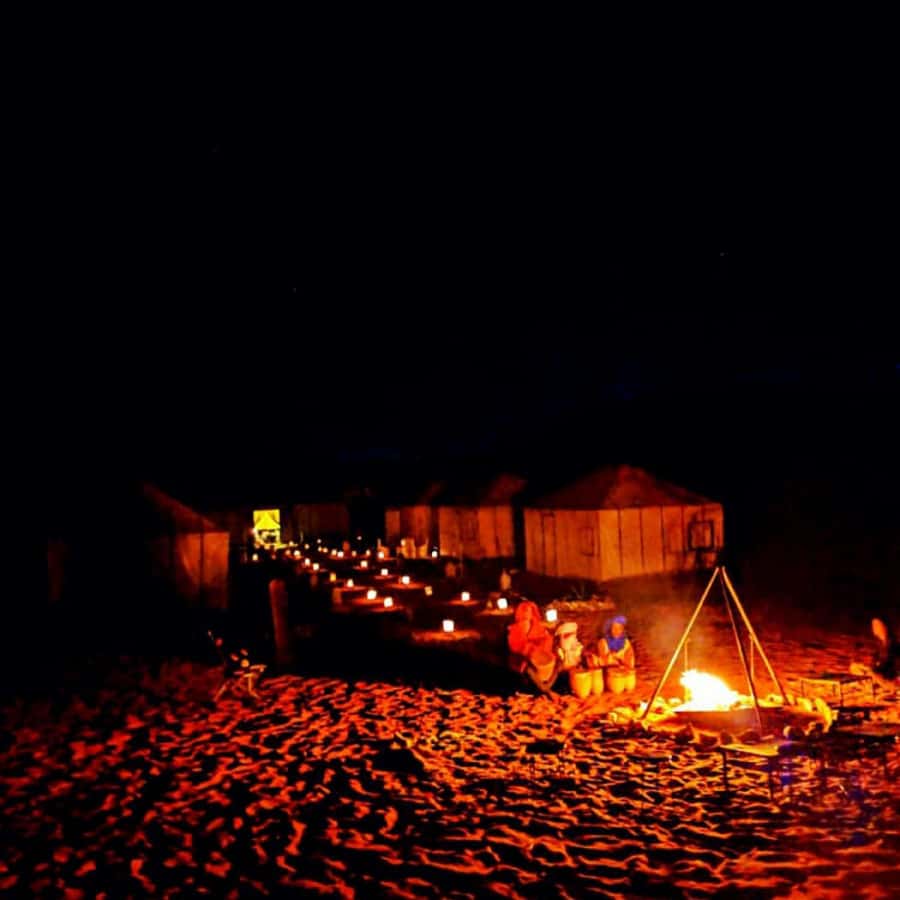 Marrakech to Zagora:2-Day Luxury Sahara Tour with Camel Ride - Desert camp night: Berber dinner, music, and stars you can actually see