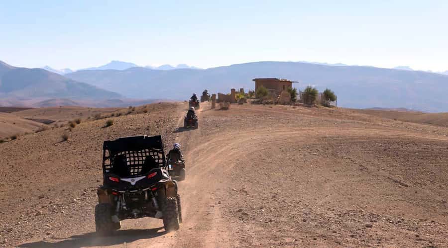 Marrakesh: Agafay Desert Quad & Camel Tour with Dinner - Camel ride in the Agafay: nomadic dress, rocky calm, and animal handling