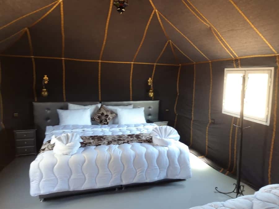 Overnight in Luxury Tent in Desert Camp Erg Chebbi Merzouga - The morning camel return and the ride-length reality