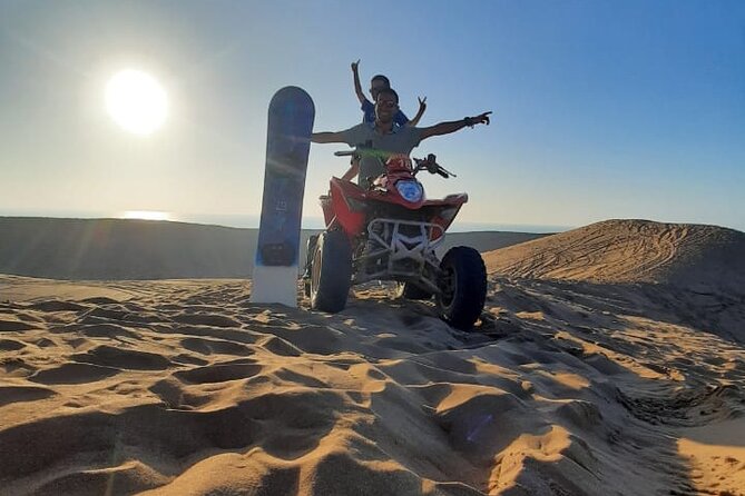 Quad Bike and Sandboarding on Sand Dunes Wild Beach - Quad biking: riding your own machine through changing terrain