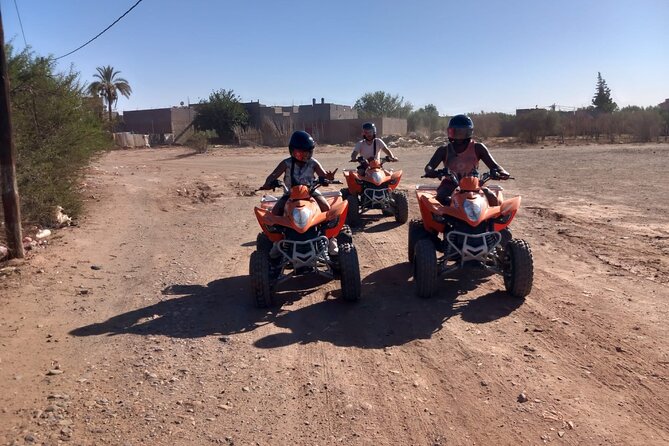 QUAD Palmeraie desert - Riding terrain you can feel: palm groves, rocky stretches, and a Berber-village stop