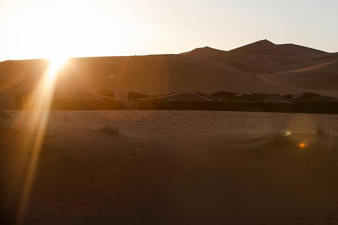 shared group Fez To Fez via Merzouga Desert Tour 2 Days/ 1 Night - Overnight desert camp: dinner, Berber show, and sleeping arrangements