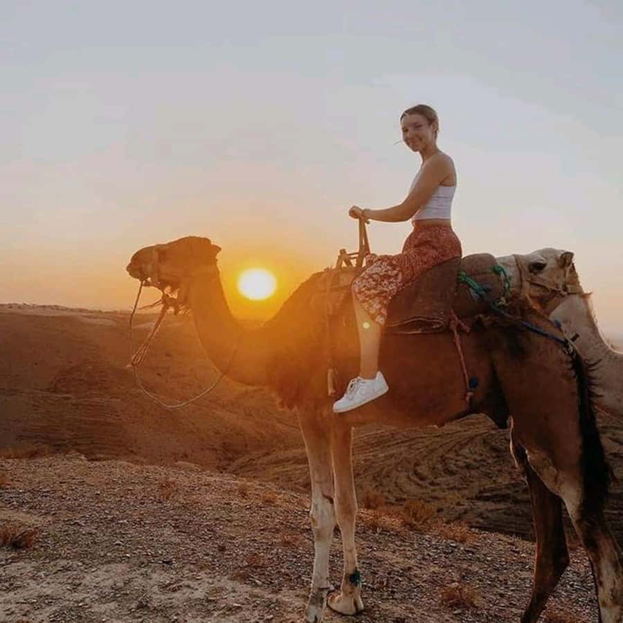 Sun set camel ride in palmerai of Marrakesh - Wear the Nomadic Dress, Then Make It Photogenic