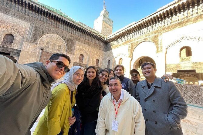 Walking Tour in Old Medina Fez with Official Guide - Stop 1: Bab Bou Jeloud, the Blue Gate that sets the tone